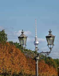 Low angle view of street light against sky