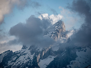 Snowcapped mountains against sky