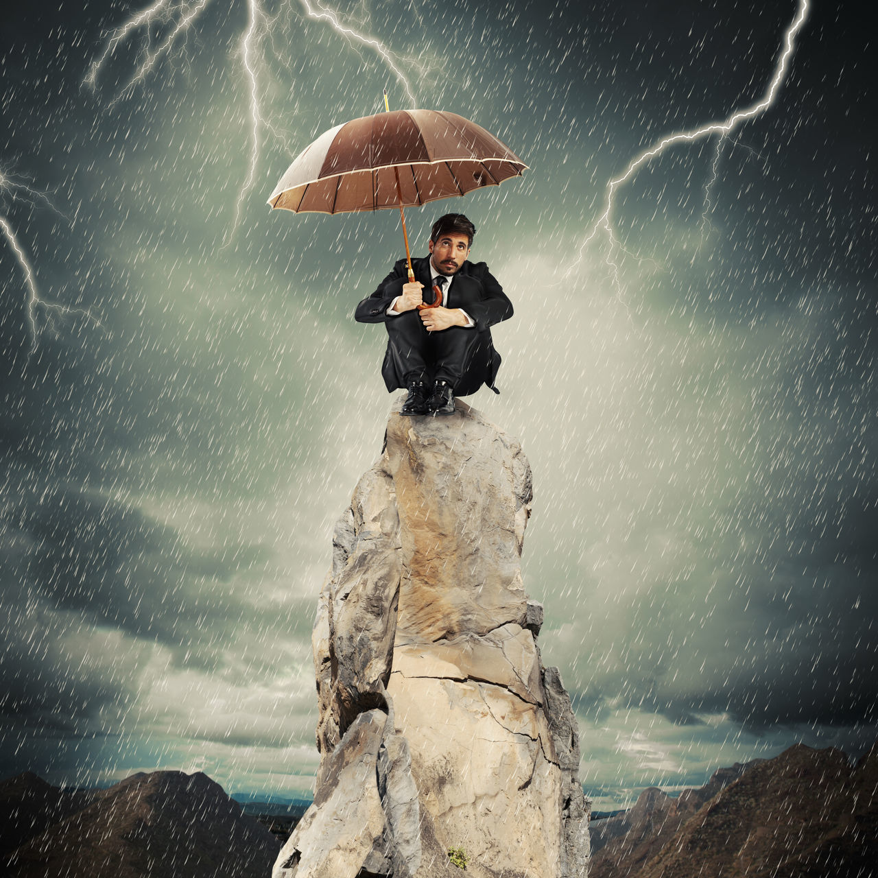 WOMAN WITH UMBRELLA STANDING IN RAIN AGAINST SKY