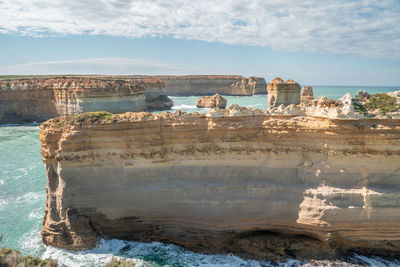 Scenic view of sea against cloudy sky