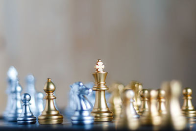 Close-up of chess pieces on board