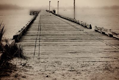 Wooden jetty leading to the sea