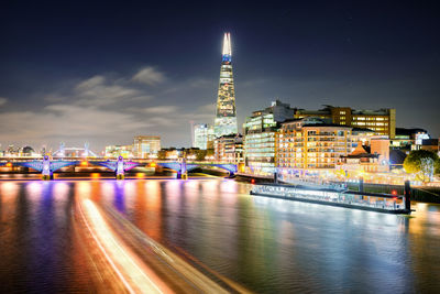 Illuminated buildings at waterfront