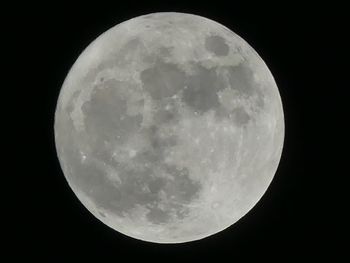 Scenic view of moon against sky at night