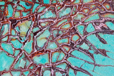 Background of rusted metal with ice crystals - textured old rusted metal with ice crystals