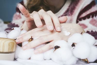 Cropped hand of woman holding ice cream