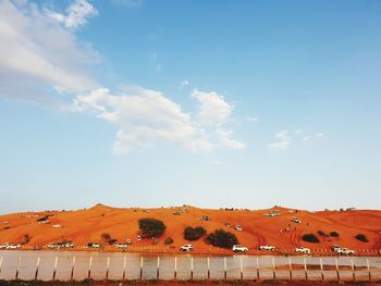 Scenic view of land against sky