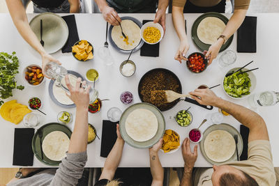 Overhead view of people having mexican food