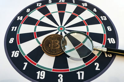 Close-up of clock over white background