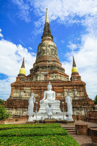 Old temple building against sky