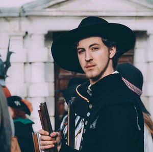 Portrait of young man wearing hat