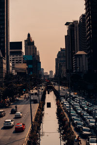 High angle view of traffic on city street and buildings