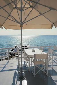 Chairs and tables at beach