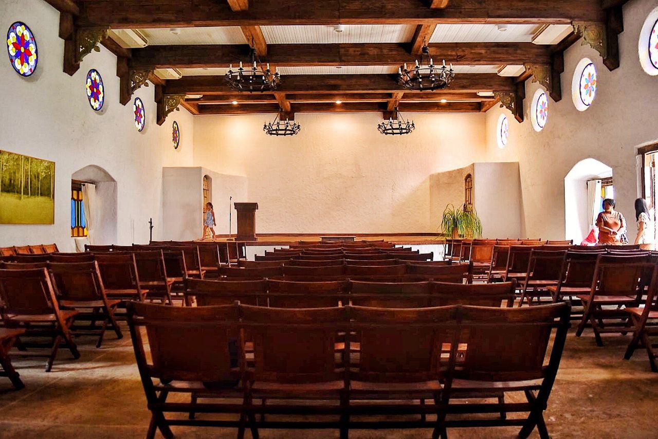 chair, indoors, seat, table, wood - material, large group of objects, arts culture and entertainment, no people, auditorium, architecture, concert hall, stage - performance space, courtroom, day