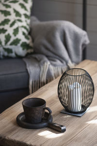 Close-up of christmas decorations on sofa at home