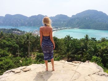 Woman standing on mountain