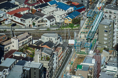 High angle view of street amidst buildings in city