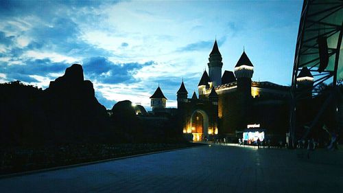 Silhouette of clock tower in city