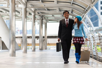 Full length of a woman walking in corridor