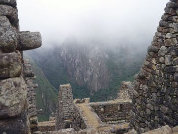 Stone wall with mountain in background