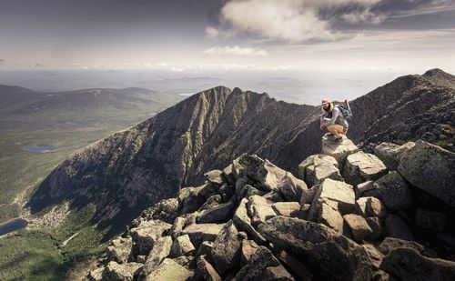 Panoramic view of rocks and mountains against sky