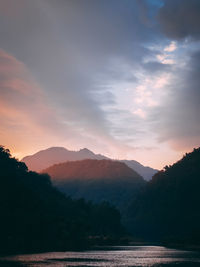 Scenic view of mountains against sky during sunset