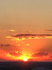 Scenic view of dramatic sky during sunset