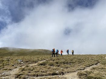 People walking on field