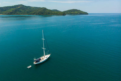 High angle view of sailboat sailing in sea