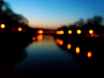 Defocused image of illuminated lights at night