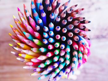 Directly above shot of colorful colored pencils on table