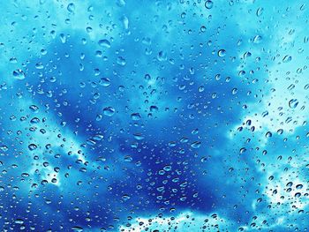 Close-up of water drops on glass