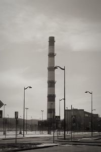 City street against cloudy sky