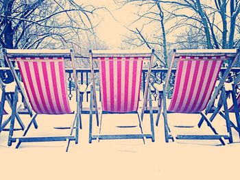 Empty chairs in a row