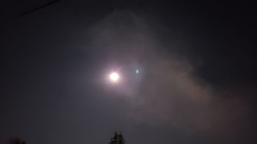 Low angle view of moon in sky