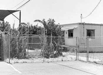 View of road along buildings