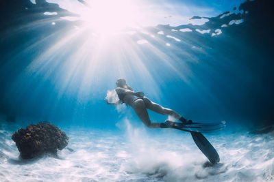 Man swimming in sea