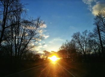 Empty road at sunset