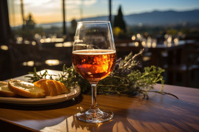 Close-up of wineglass on table