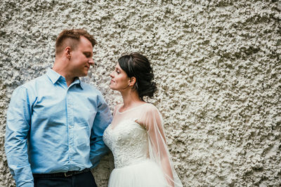 Young couple standing outdoors