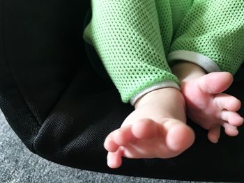 Low section of baby feet