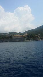 Scenic view of sea against cloudy sky