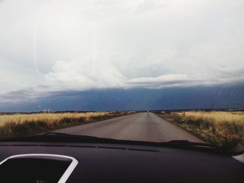 Country road passing through landscape