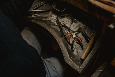 Low section of man working on wood