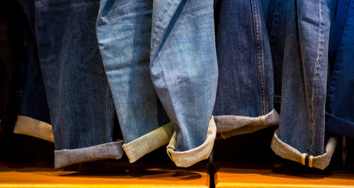 Jeans hanging in closet