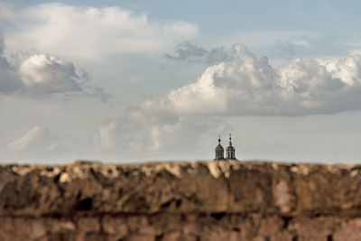 Scenic view of rocks on land against sky