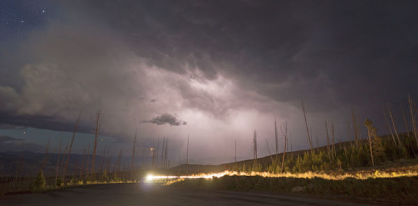 Storm clouds over road