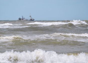 Scenic view of sea against clear sky