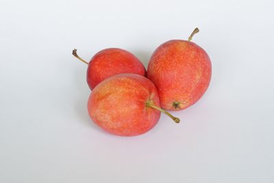 Close-up of apple against white background