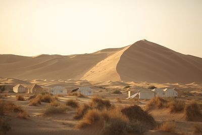 Scenic view of desert against clear sky